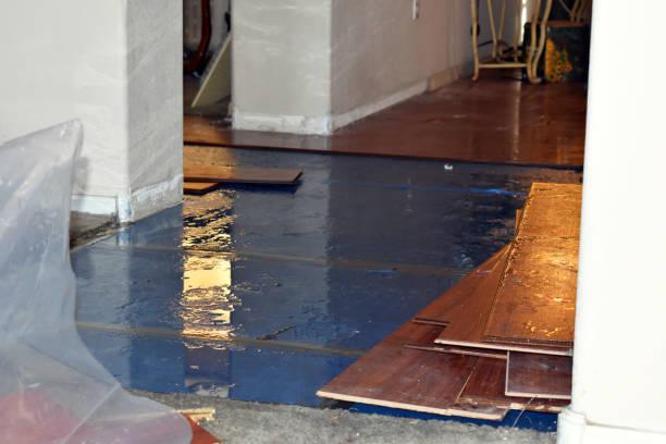 Professional Flood Damage Restoration technician working in Baileys Harbor, WI